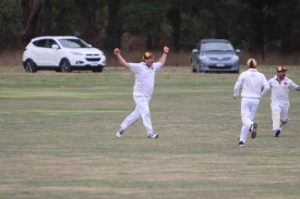 Pomborneit’s division one players celebrate the final wicket of the Lakers’ innings which secured the 2019/20 flag. 
