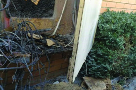 Fire: The charred remains of a fuse box following a fire which broke out at the Herriot Street units. 