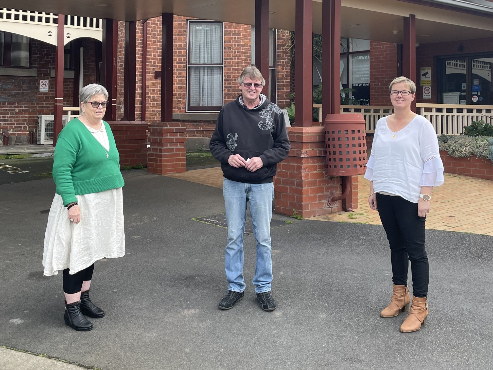 Hampden Social Club member Michael O’Neil hands over a $4000 donation to SWH’s Andrea James.