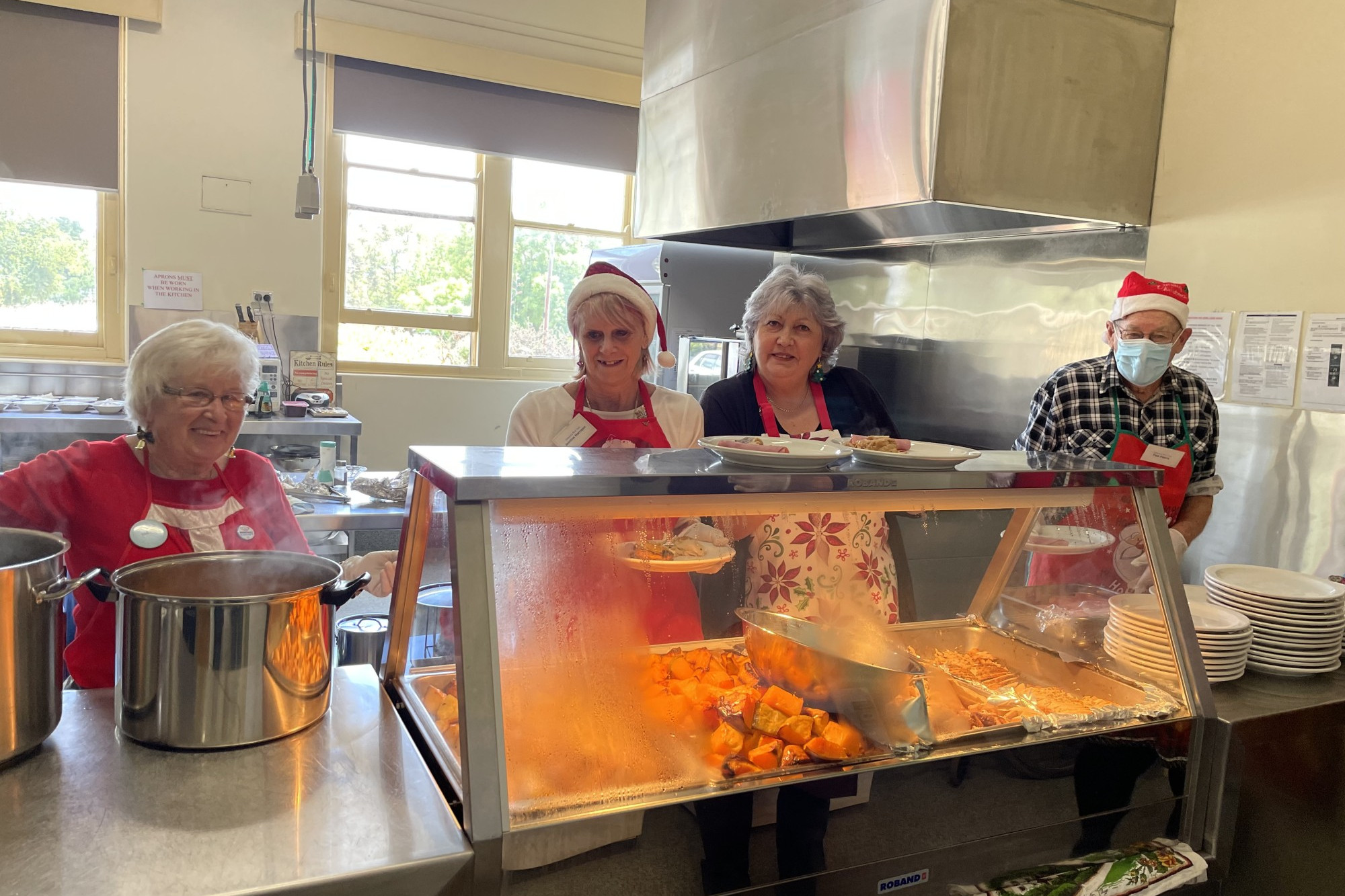 Luncheon: Volunteers were hard at work helping to create some Christmas cheer with the annual Christmas community meal in Camperdown.