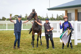 Matt Cumani’s stable staff and jockey Patrick Moloney celebrate Declares War’s win in the Camperdown Cup. Picture supplied by Reg Ryan/Racing Photos