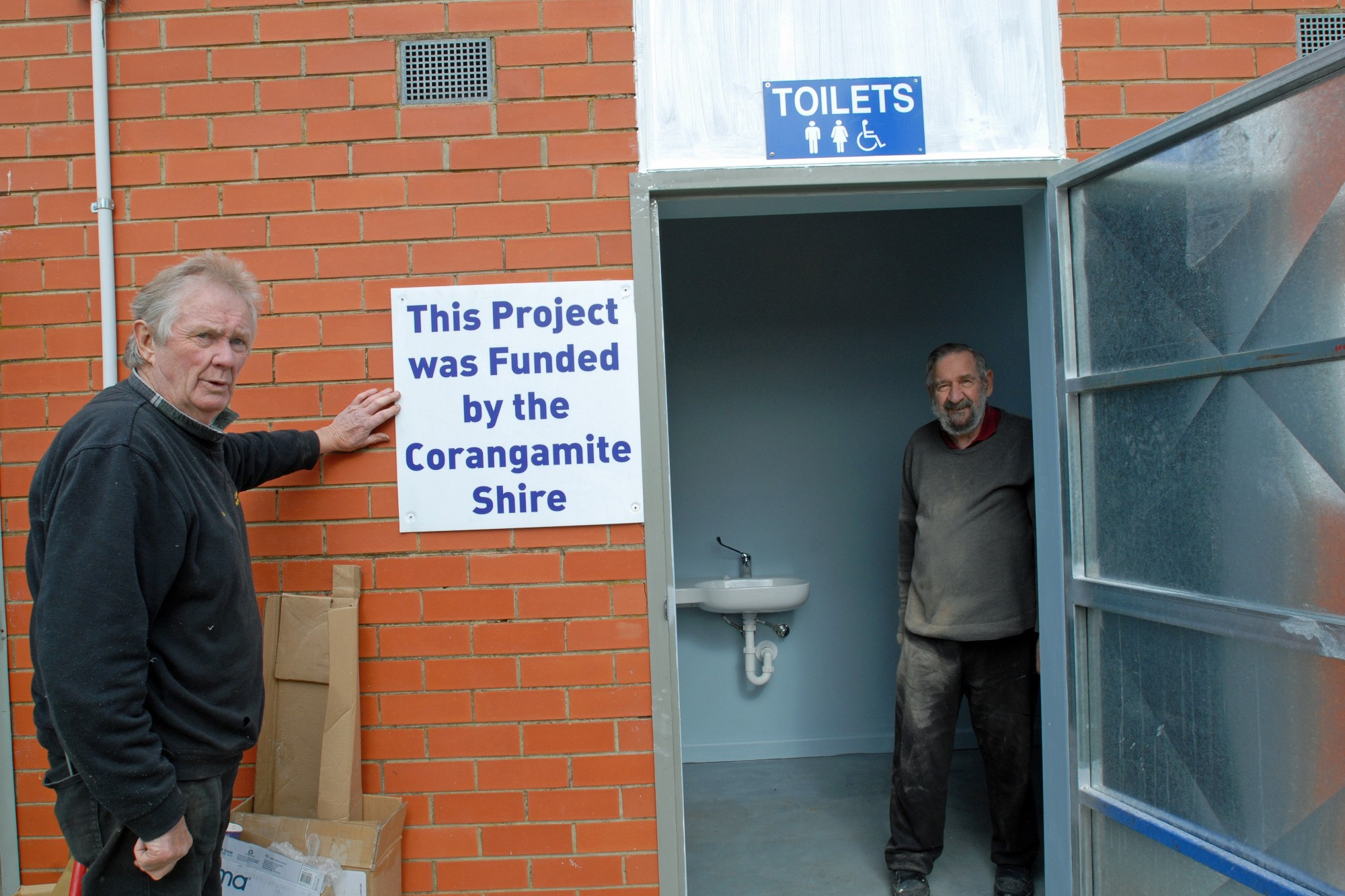 Project well supported: Lismore Men’s Shed members Jim Anderson and Stan Foote celebrate the completion of key upgrades at the shed.