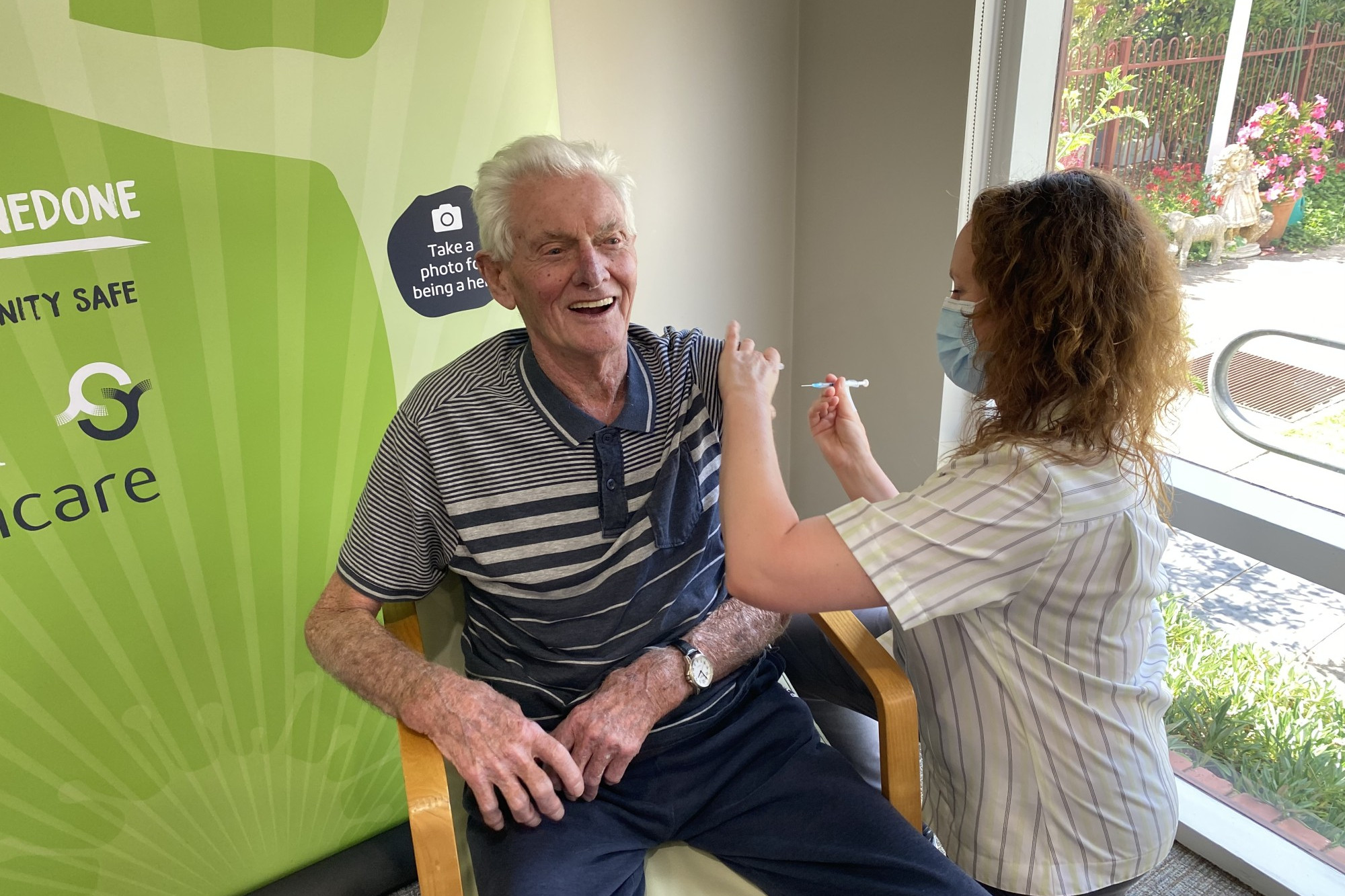 Vaccinations: Ray Riches was the first Merindah Lodge resident to receive the COVID-19 vaccination from Tash Swayne.