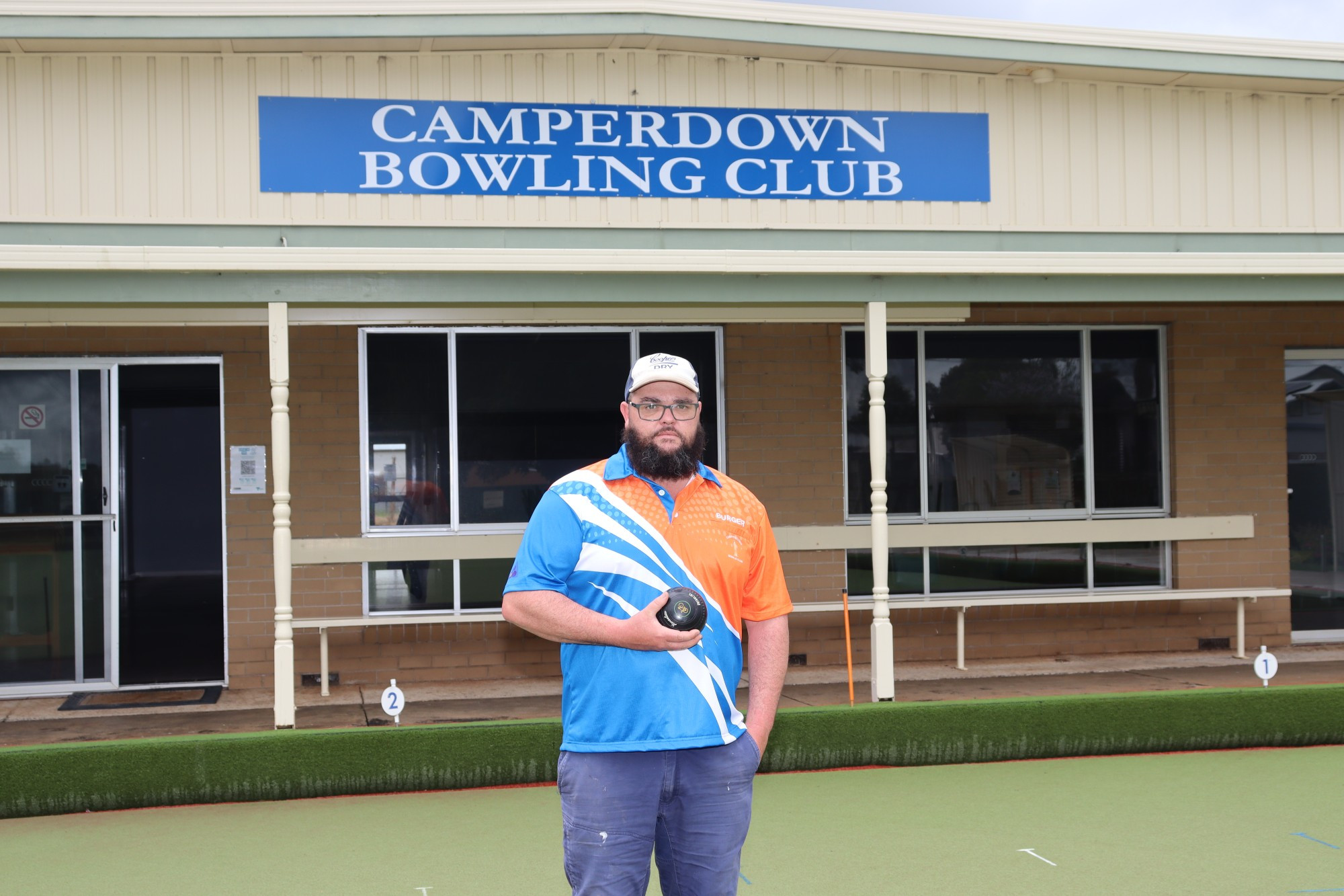 Ready to roll: Camperdown president Matthew Brewer, modelling the club’s new playing top, is looking forward to the start of the Corangamite bowls season.