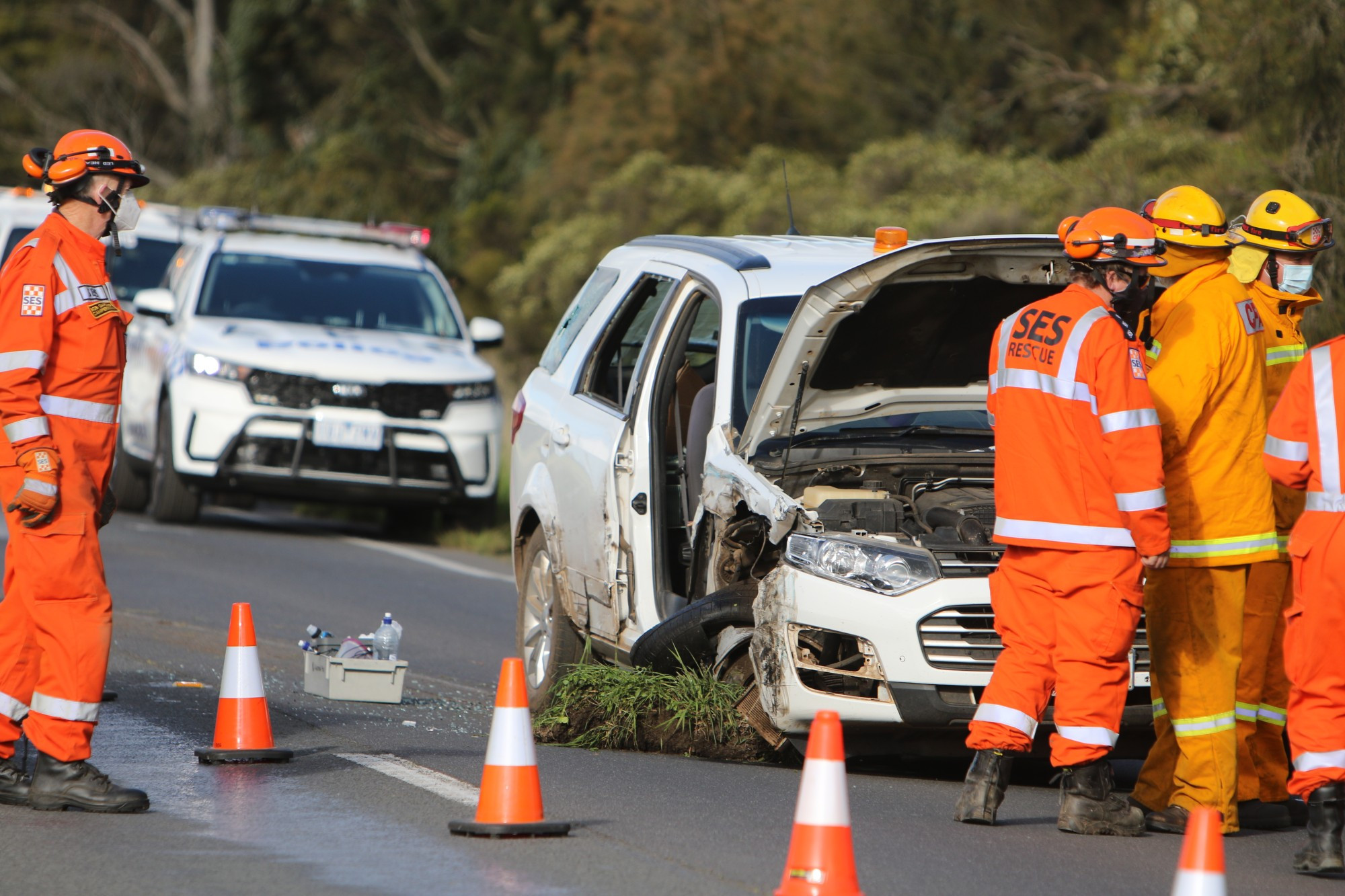 Take care: A driver collided with a truck at Weerite on Monday. Emergency services attended the scene, with the highway blocked while debris was cleared.