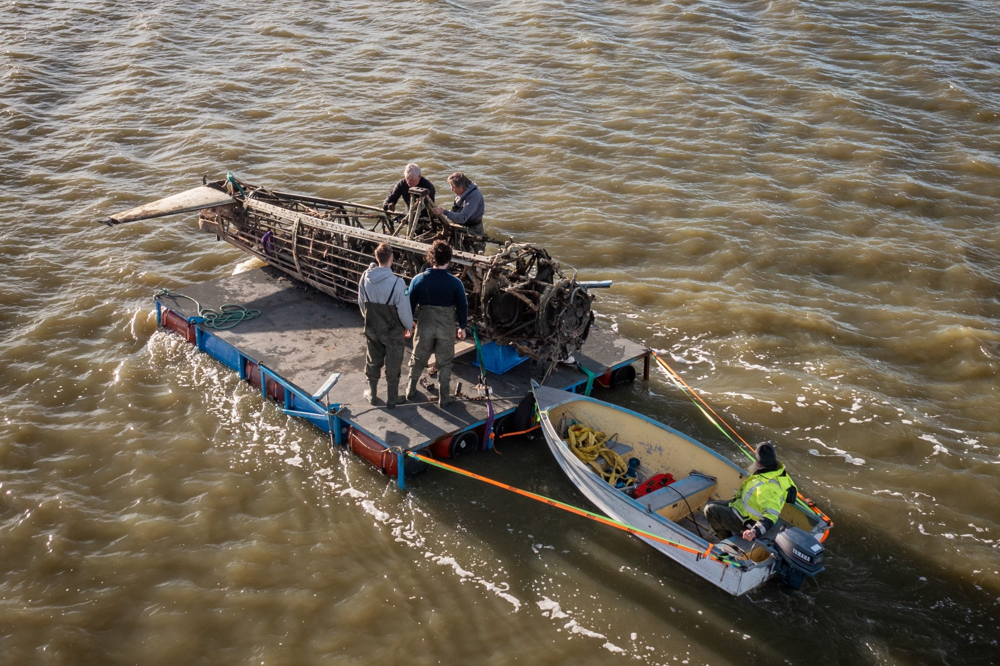 Exciting times: After more than 12 years of planning a CAC Wirraway body was removed from Lake Corangamite over the weekend. Photo supplied by Jonn Stewart