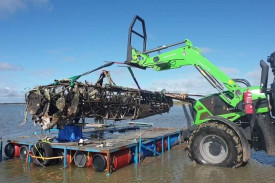 The plane body was loaded onto a barge. Photo supplied by Jarrod Tippins