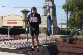Camperdown College’s Syd Bateman completes a reading during the service. 