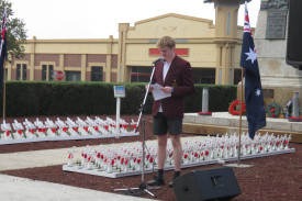 MRC student Jackson Gill reads the special exhortation. 