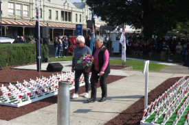 Residents laid wreaths at the service. 