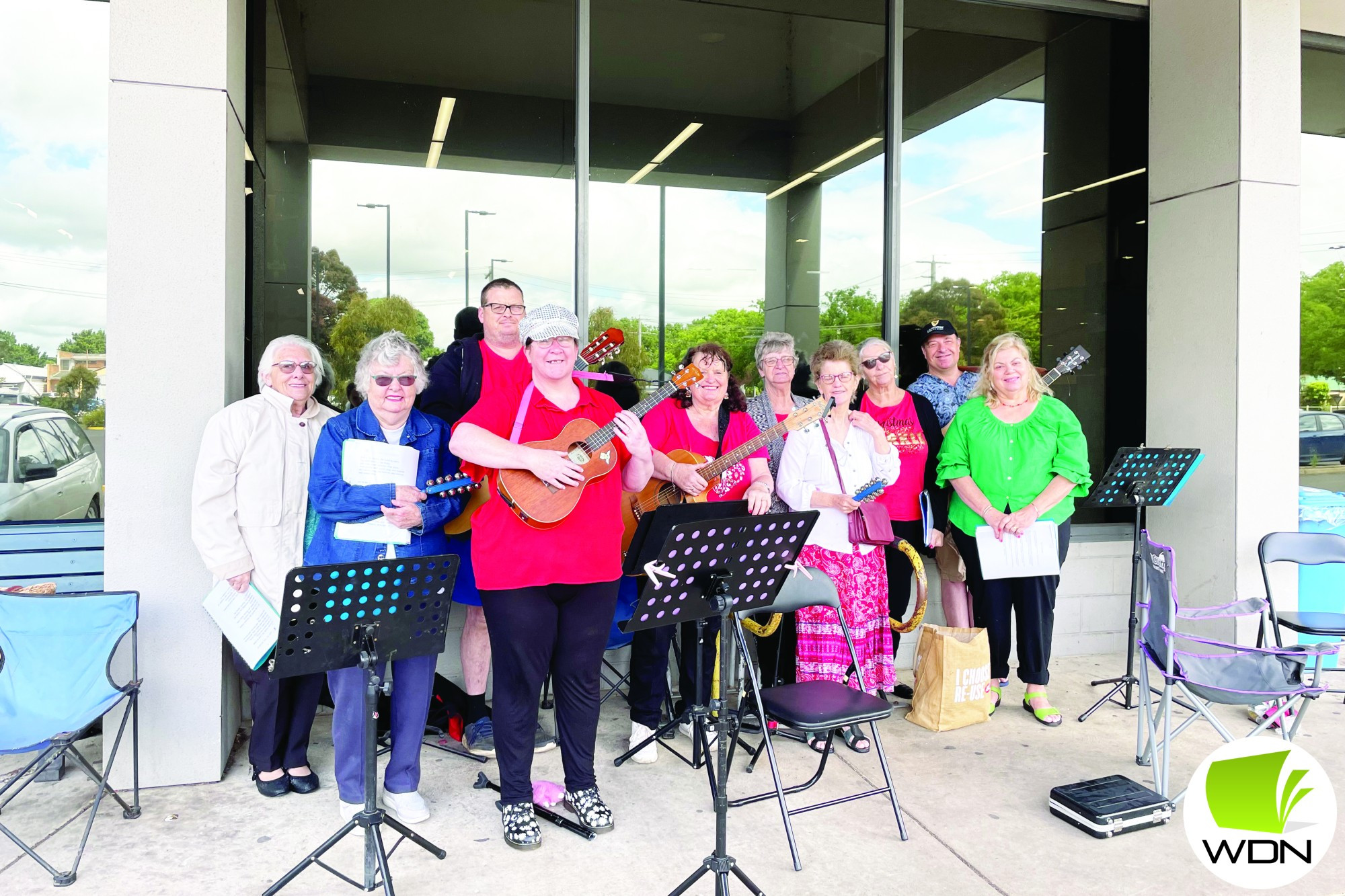 Carollers perform - feature photo