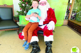 Nixon Podger fills Santa in on his Christmas wish list this year.