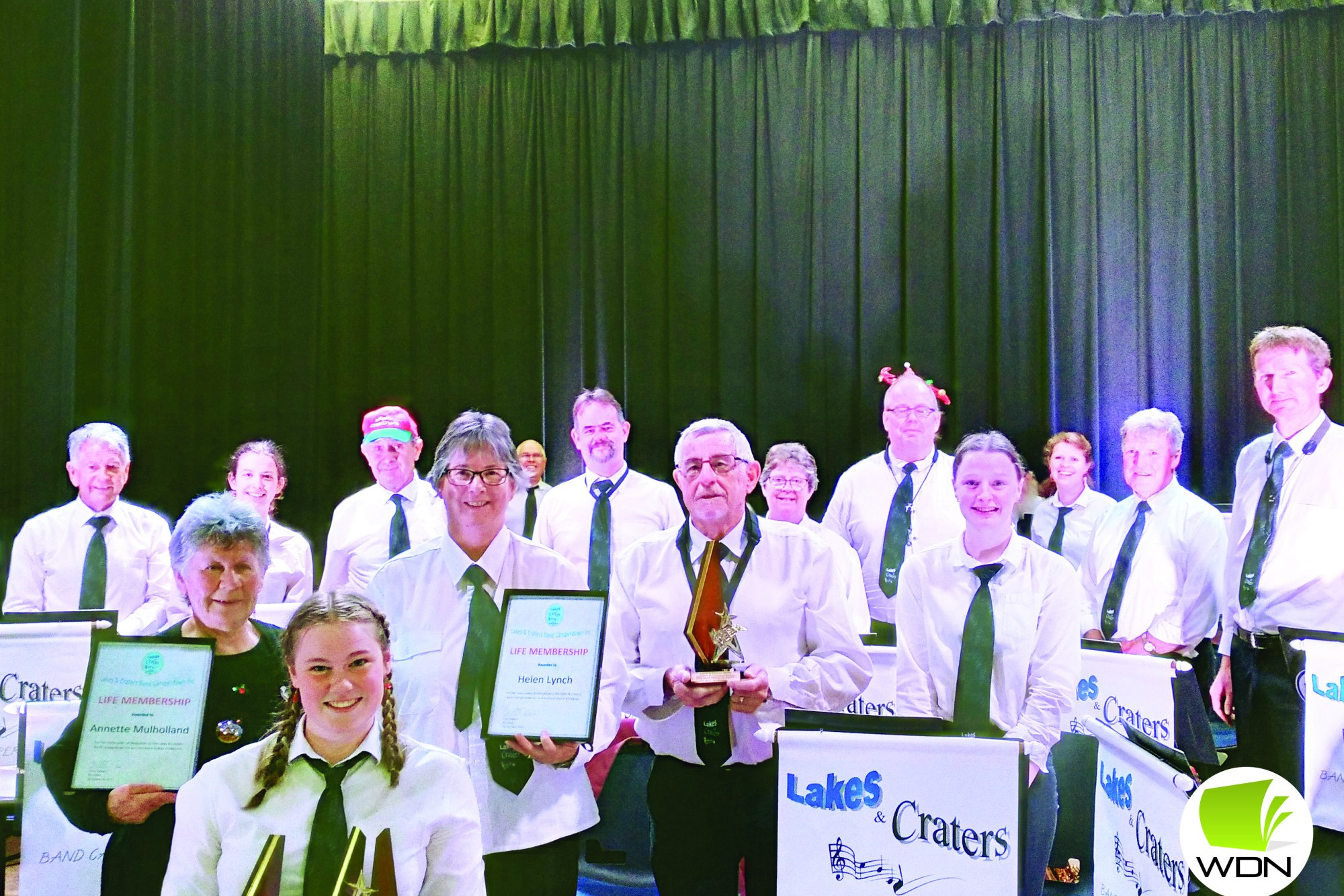 Congratulations: Lakes and Craters Band members Annette Mulholland, Amy Stewart, Helen Lynch and Ray Bowden received awards recently which were presented at the band’s final performance in Cobden.