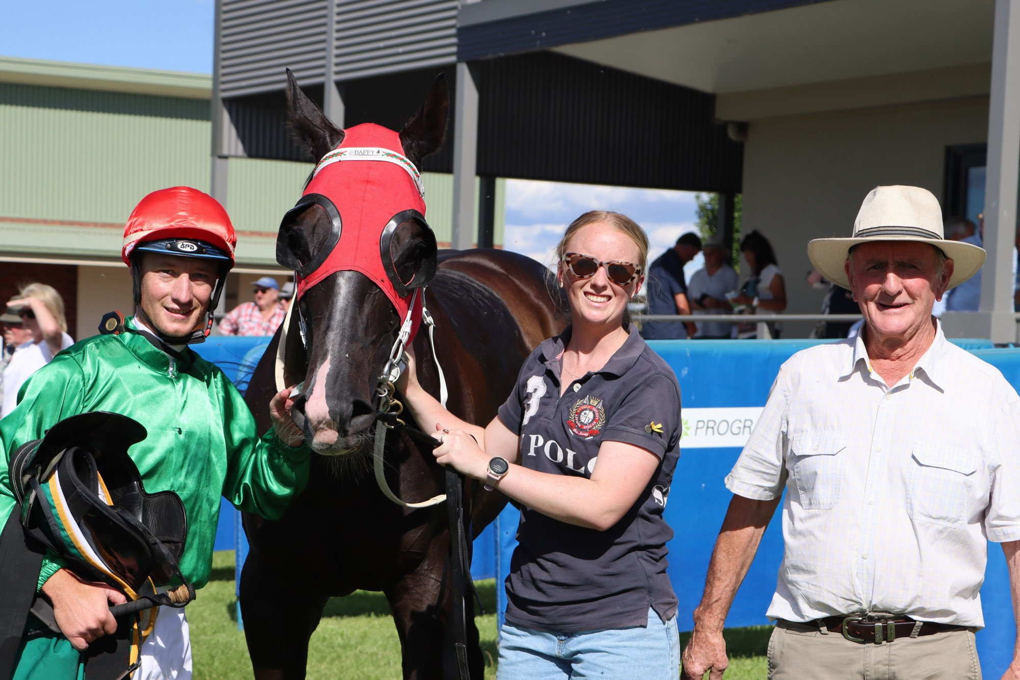 Happy days: Victorious jockey Jack Hill (left), owner Harriet Place and trainer Denis Daffy celebrate Fabian’s Spirit’s win at Ararat last Sunday. Picture supplied by Ross Holburt/Racing Photos