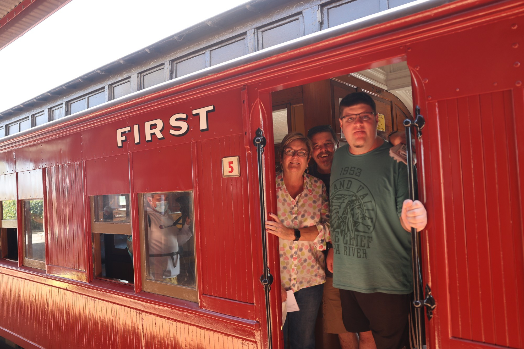 Long history: Corangamite Shire Council mayor Ruth Gstrein, husband Peter and son Chris, board the Otway Explorer vintage train in Camperdown over the weekend.
