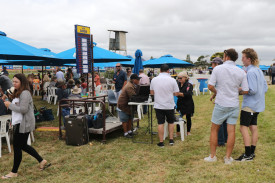 Racegoers place a bet before one of the races. 