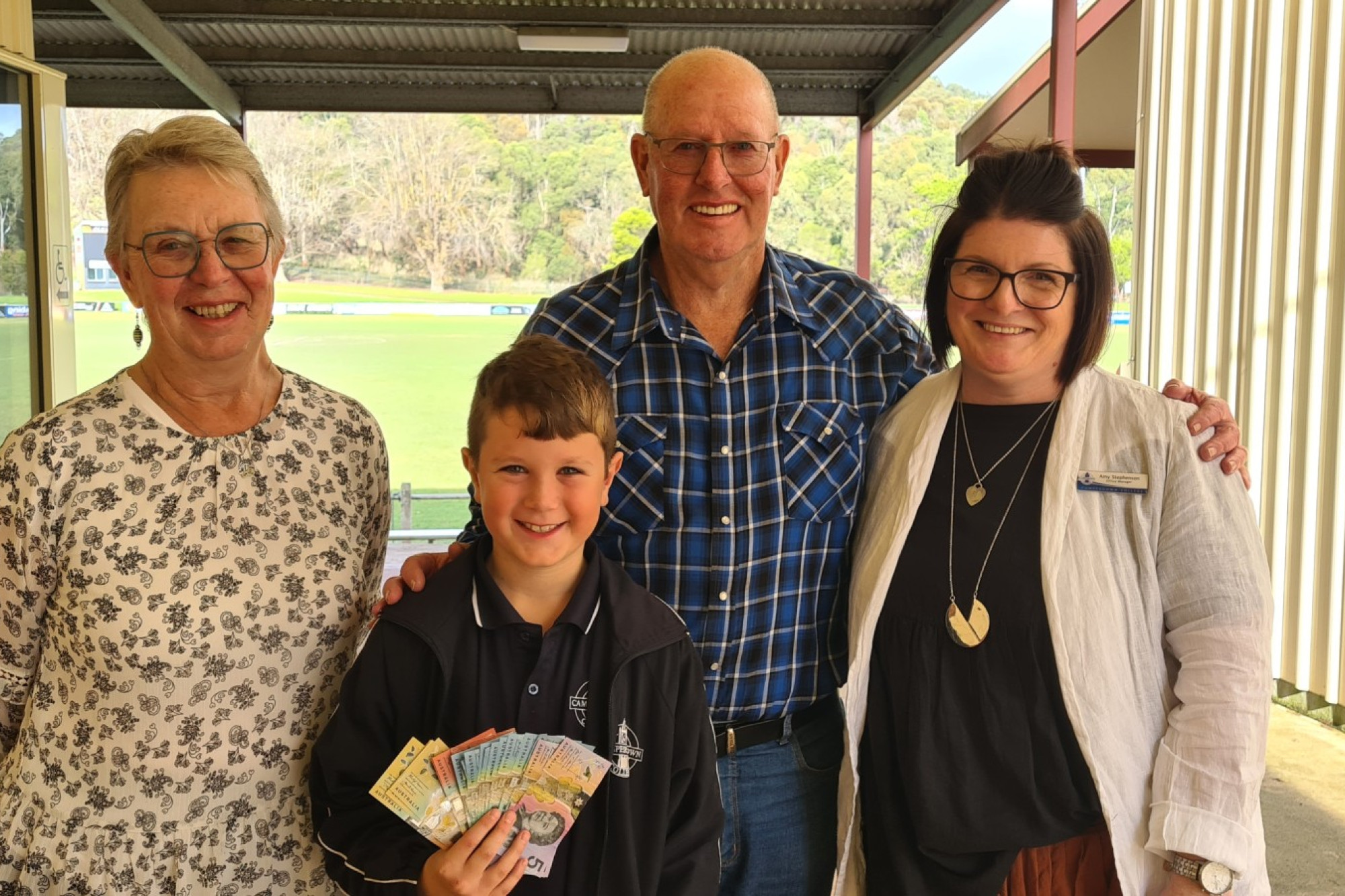 Stellar effort: Camperdown College grade 5 student Miller Murphy, pictured with Barb and Ian Boyd from Morning Melodies and Amy Stephenson, helped raise more than $2500 to help find a cure for brain cancer.