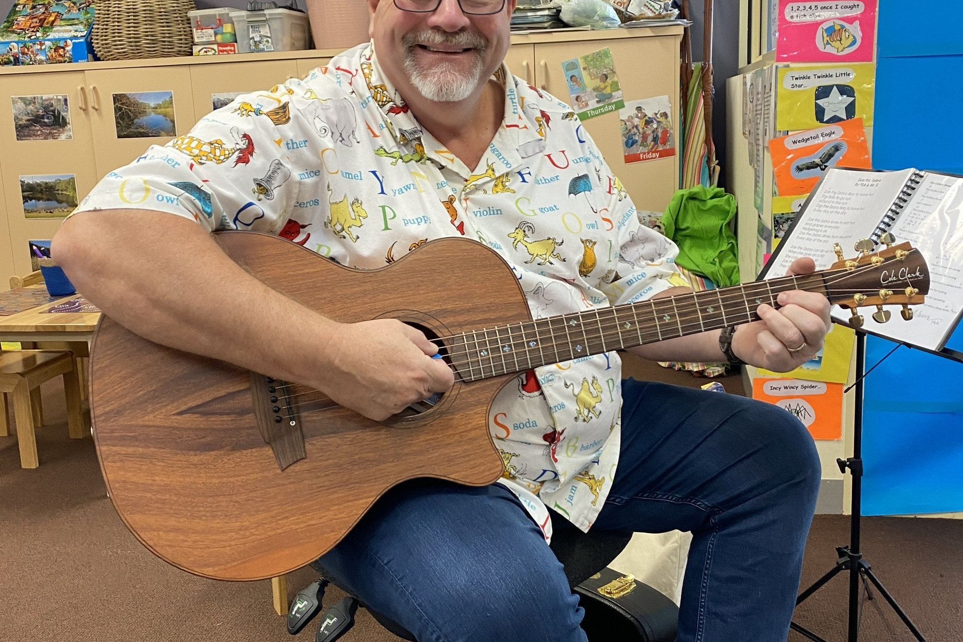 St. Patrick’s School foundation teacher Mick Saunders aka ‘Mr. S.’, playing his song ‘Cutlery drawer’ complete with cutlery headwear.