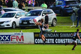 Charlie Lucas takes an uncontested mark for the Magpies.