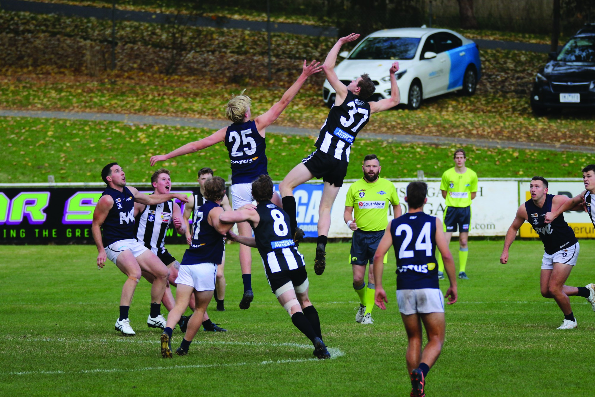 Camperdown ruckman Ethan Coates gets above Warrnambool’s Benedict Howard in the contest.