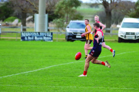 Beau Ketchen gets a kick away during last Saturday’s clash with Tatyoon.