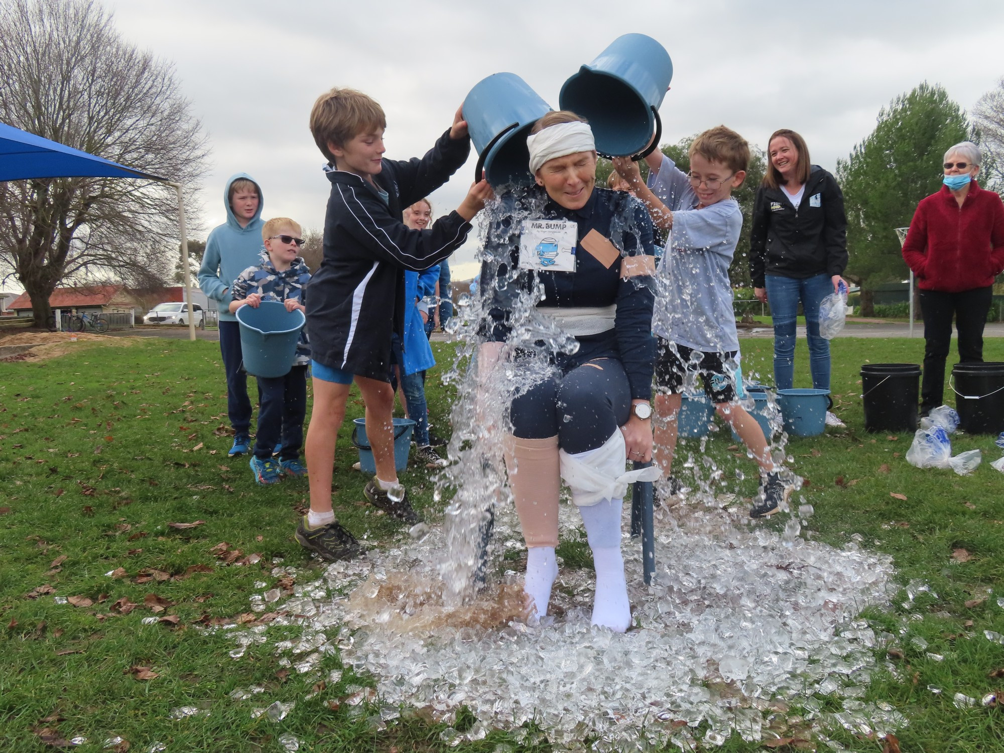 Fundraiser: Students at Camperdown College helped raise funds for MND last week, with a blue day at both campuses. Brothers Aaron and Isaac volunteer for the fundraiser.