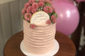 A cake helped mark the occasion, with past and present staff, along with family and friends attending the celebration. 