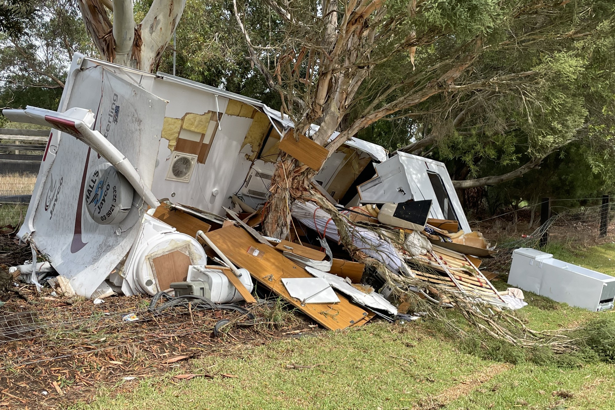 Lucky escape: Emergency services were called to a collision at Gnotuk over the weekend, which saw a caravan completely decimated against a tree.