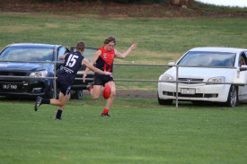 Brad Ward drives the ball forward for Lismore Derrinallum. 