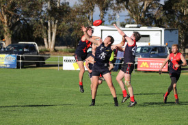 Brad Ward and Josh Anderson compete for the high ball.