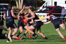 Dale Marquand attempts to drag down his opponent. 