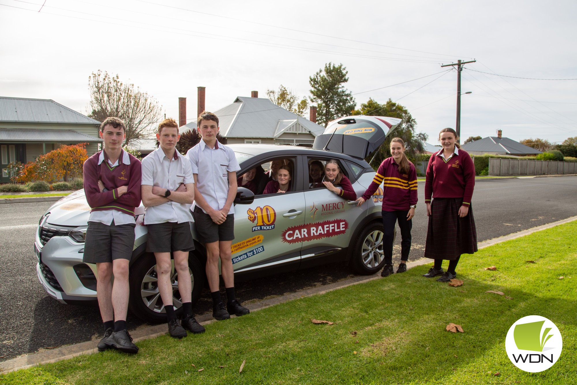 Tickets on sale: MRC students show off first prize in this year’s annual car raffle – a Renault Captur worth almost $35,000.