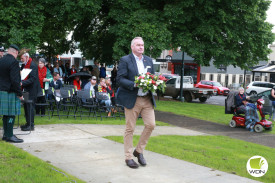 Corangamite Shire councillor Laurie Hickey lays a wreath.