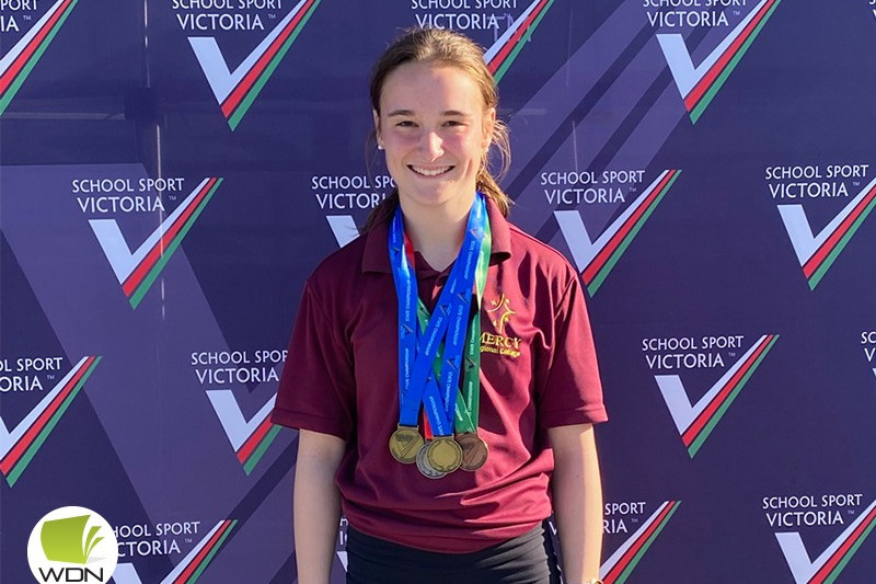 Success: Ruby Darcy with her medal haul from the state championships.