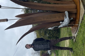Artist Mike Makatron designed the sculpture after meeting with residents and learning about what made the community tick.