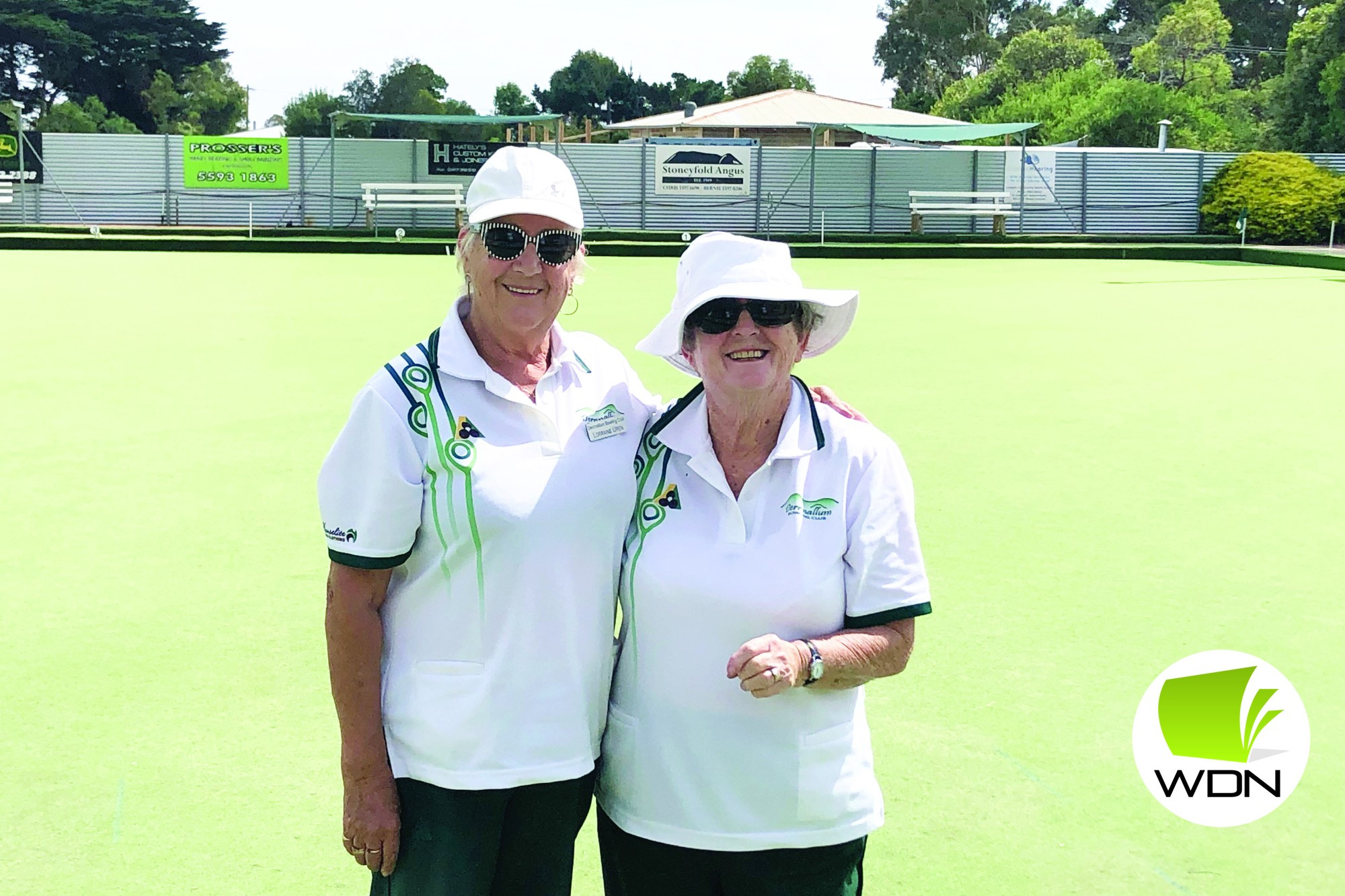 Jane French (right) celebrates her victory with runner-up Lorraine Uren.