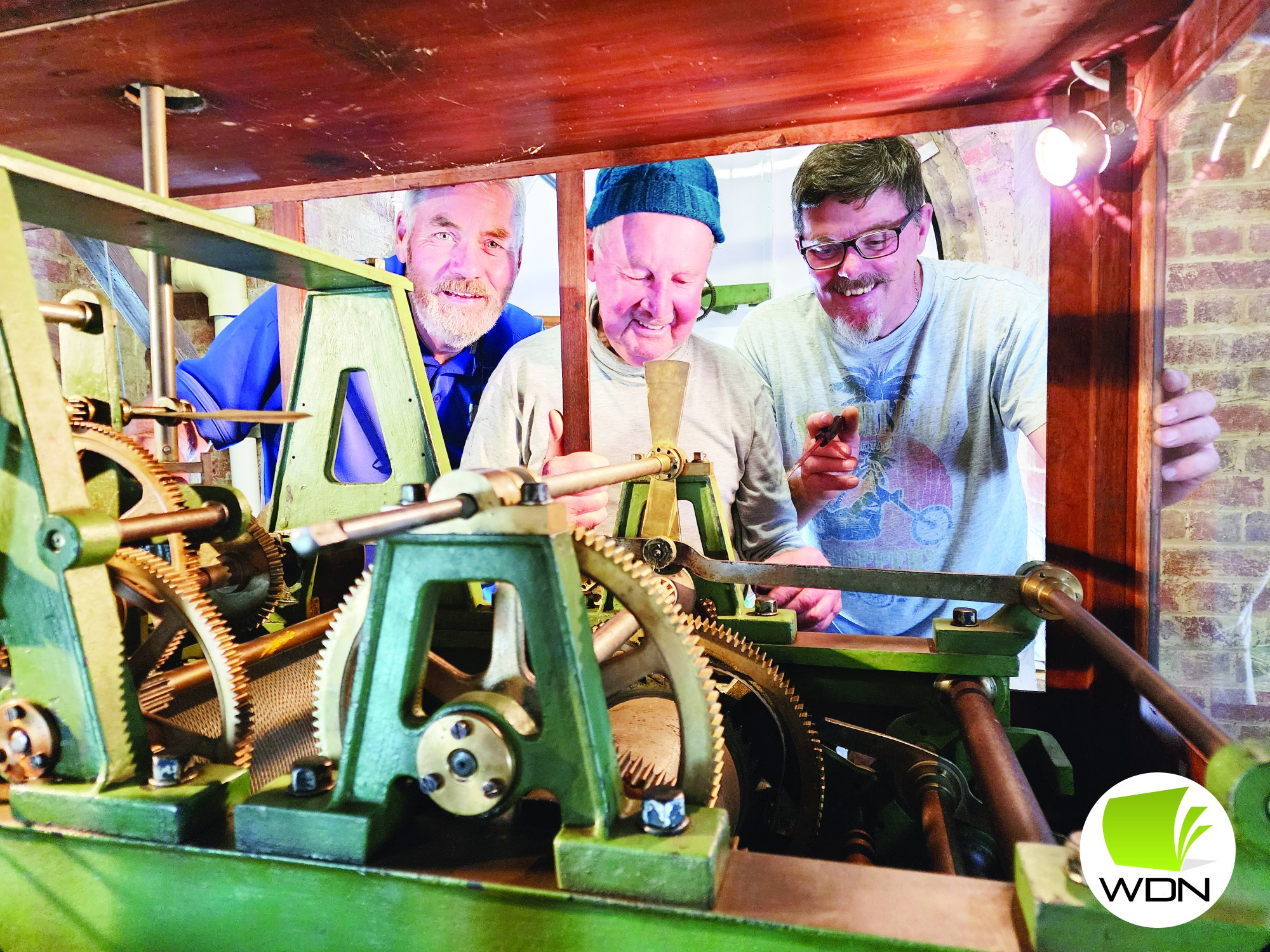 Exciting: John Hulm, who was instrumental in securing a grant to restore mechanisms in Camperdown’s iconic clock tower, helps reinstall the parts.