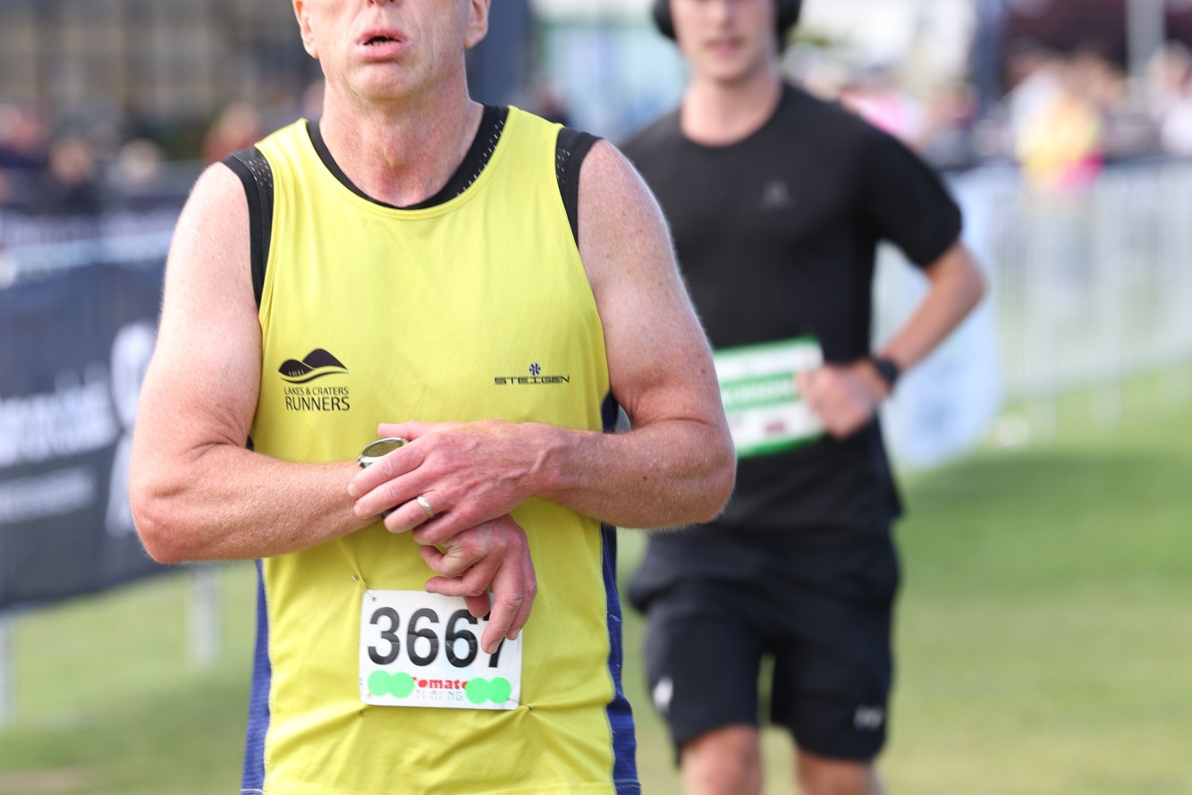 Camperdown runner Brian Cunningham crosses the line.