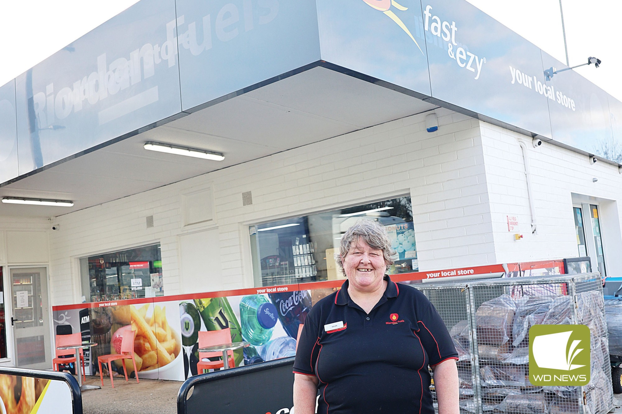 New owners: Riordan Fuels employee Helen Kirk in front of the Lismore service station, one of six sites purchased by Viva Energy.