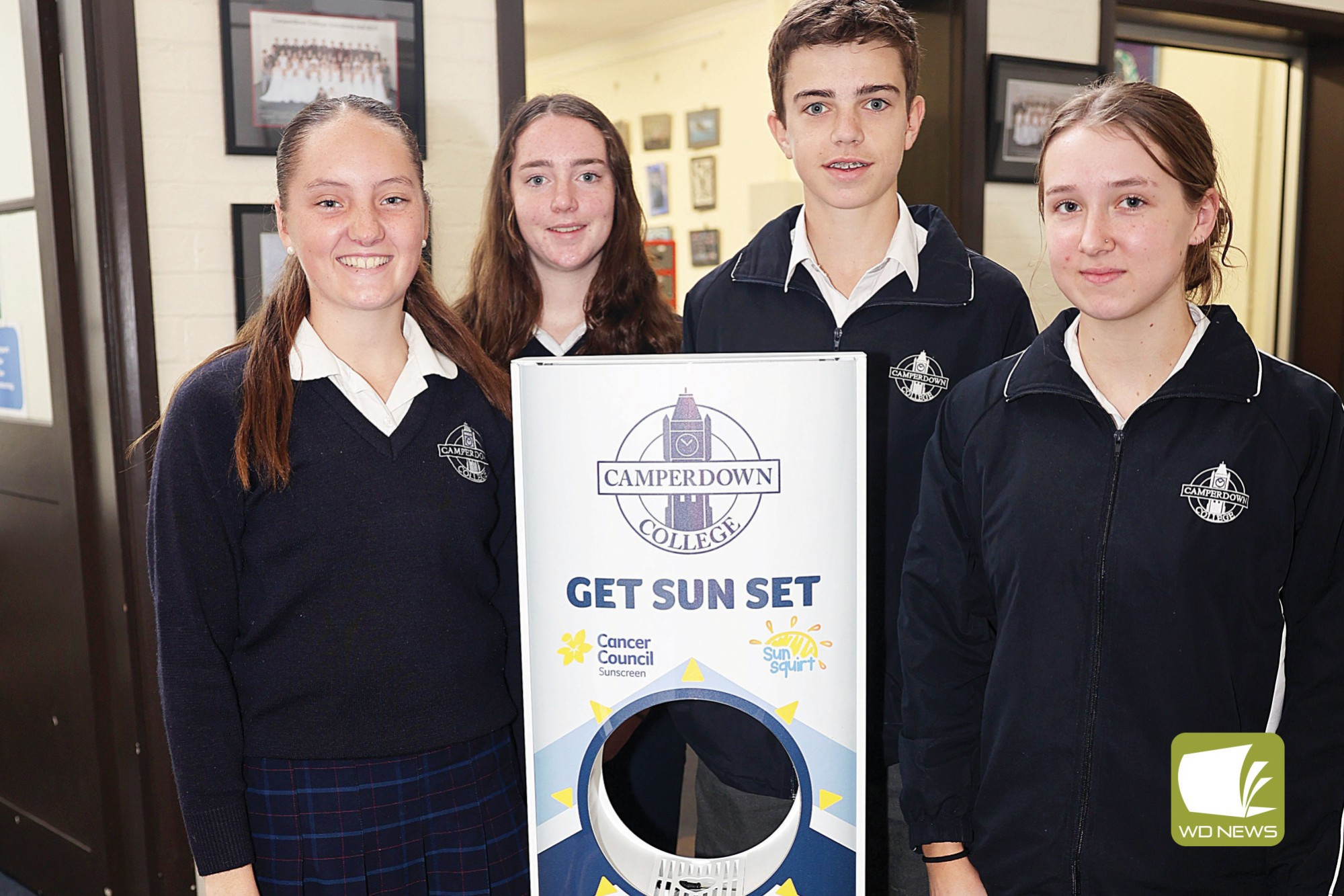 Adding sun protection: Camperdown College students Sadie Walsh, Rebecca Johnson, Finn Tolland and Stella Horspole, with the school’s new sunscreen kiosk.