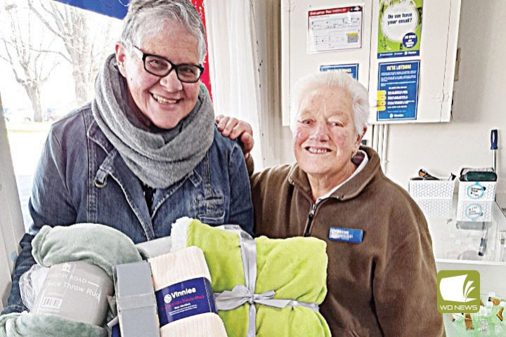 Congratulations: Paula Robertson, pictured with St Vincent de Paul Society volunteer Margaret Patterson, won Camperdown’s CEO Sleepout raffle.