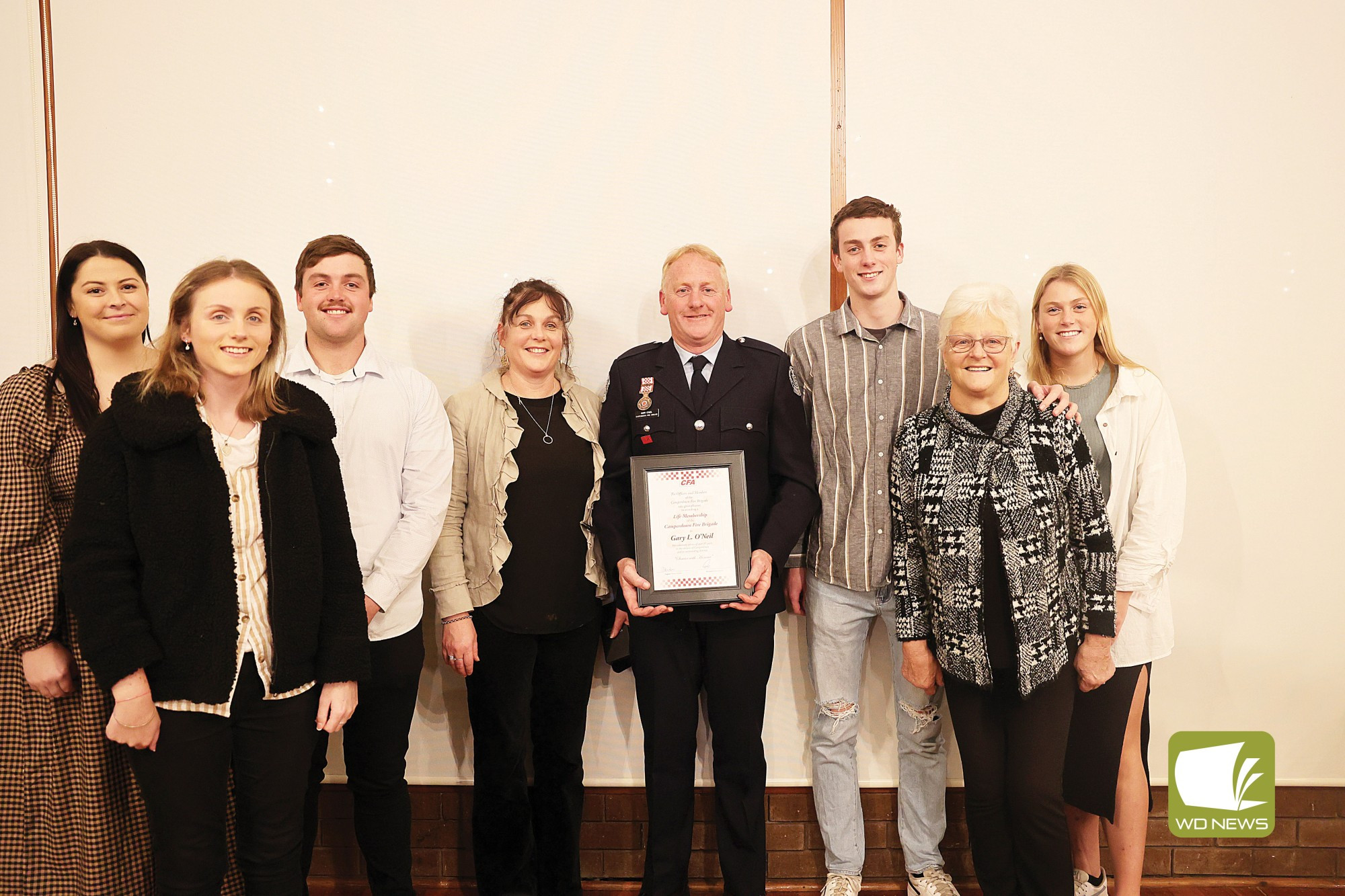 A proud family: Life member Gary O’Neil (centre) was honoured in front of his family at a special function at Camperdown Golf Course.