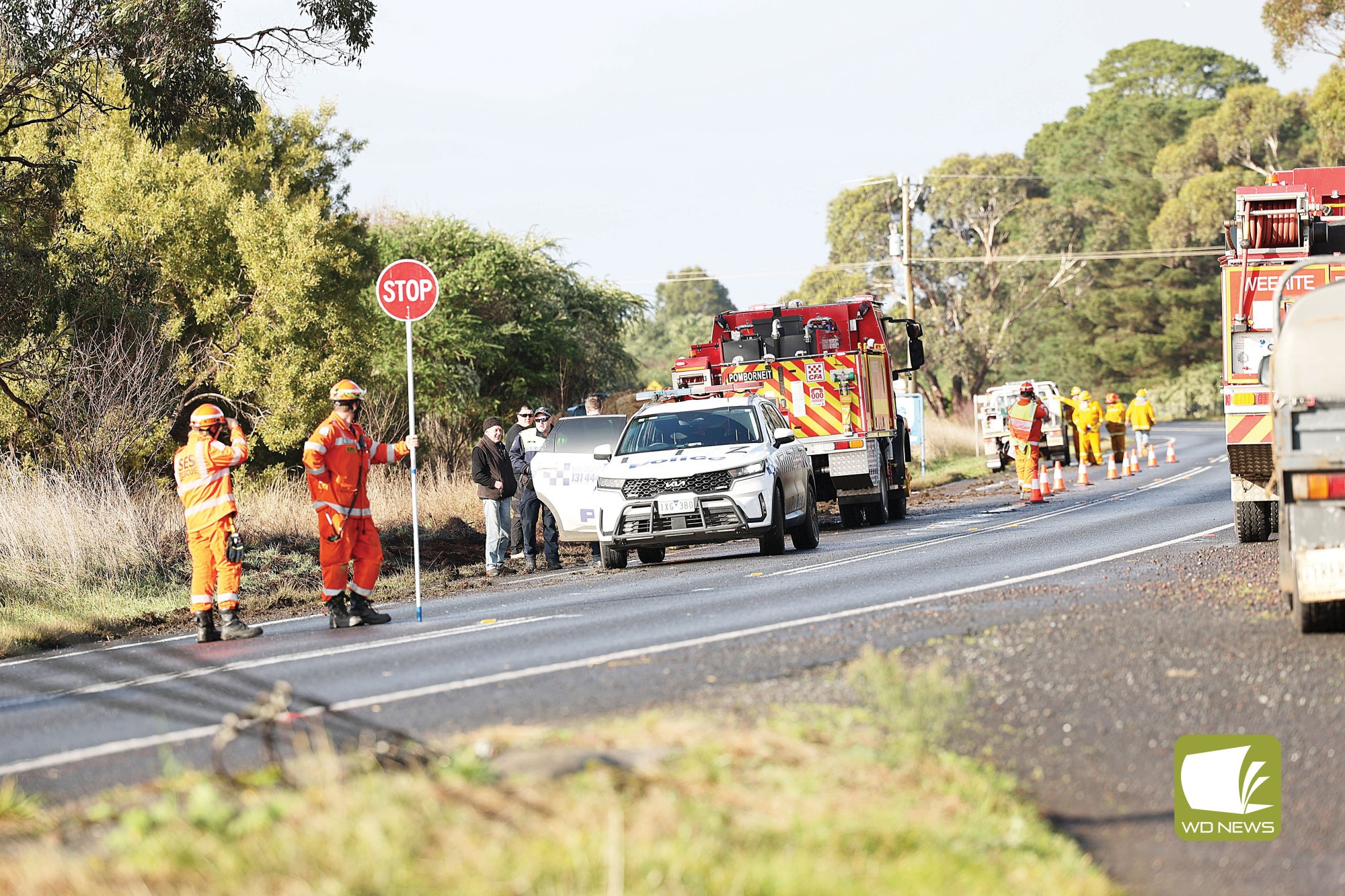 Tipped truck causes delays - feature photo