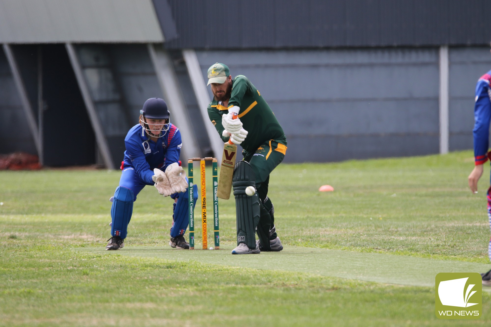 Tim Fitzgerald keeps both eyes on the ball on his way to a handy 43.