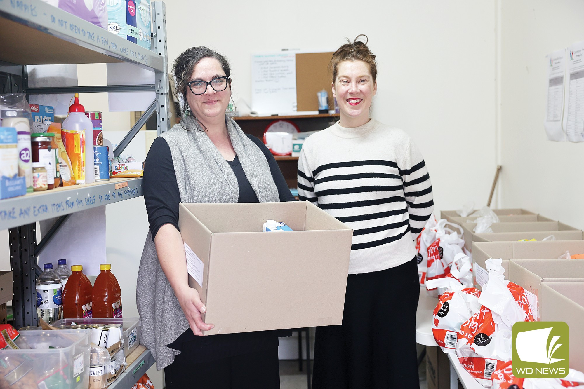 Easing the burden: Community House coordinator Emily Mercer (left) and South West Community Foundation Executive officer Annabel Cussen (right).