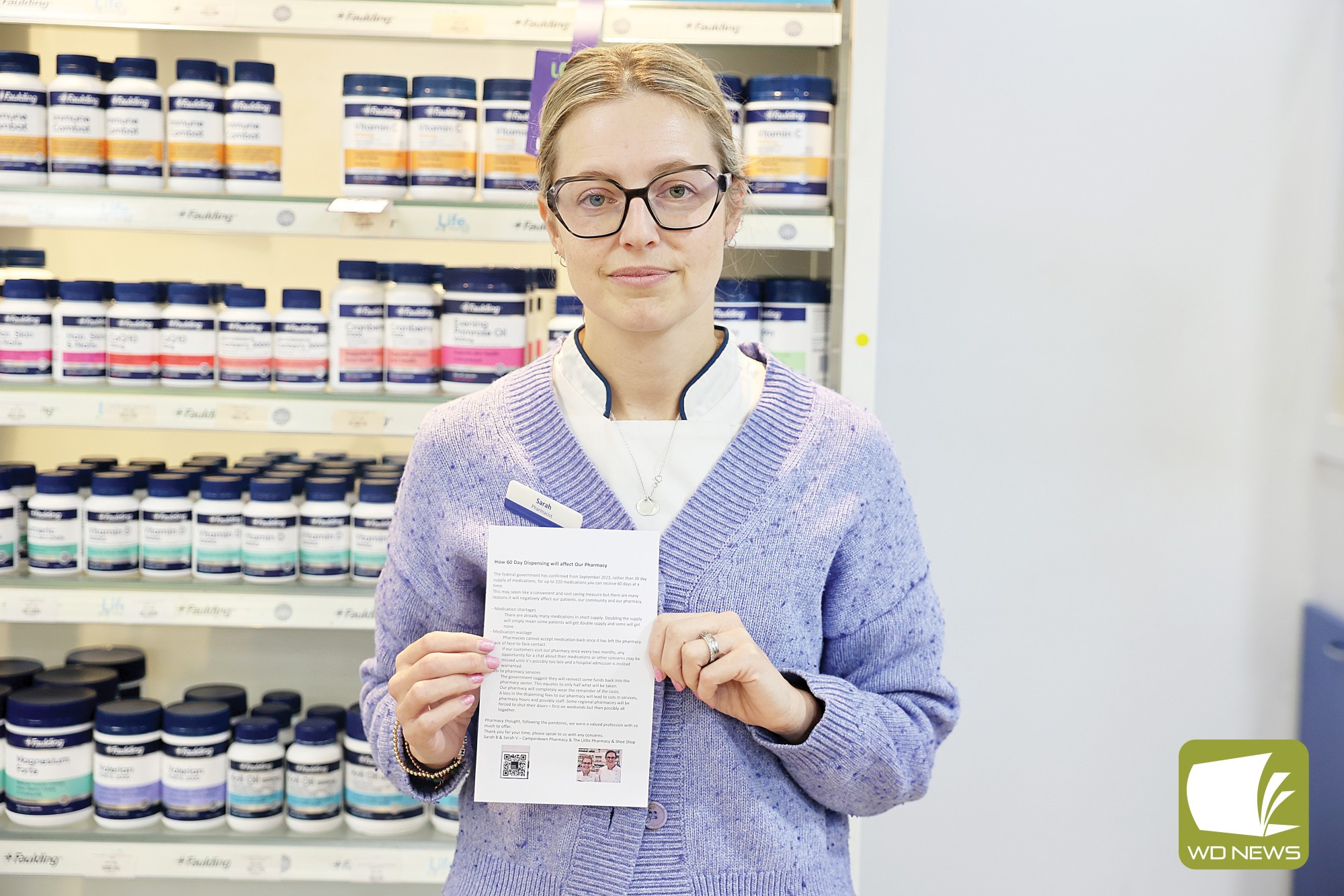 Calling for signatures: Camperdown Pharmacy and the Little Pharmacy and Shoe Shop’s Sarah Baker, pictured with an information sheet for the petition.