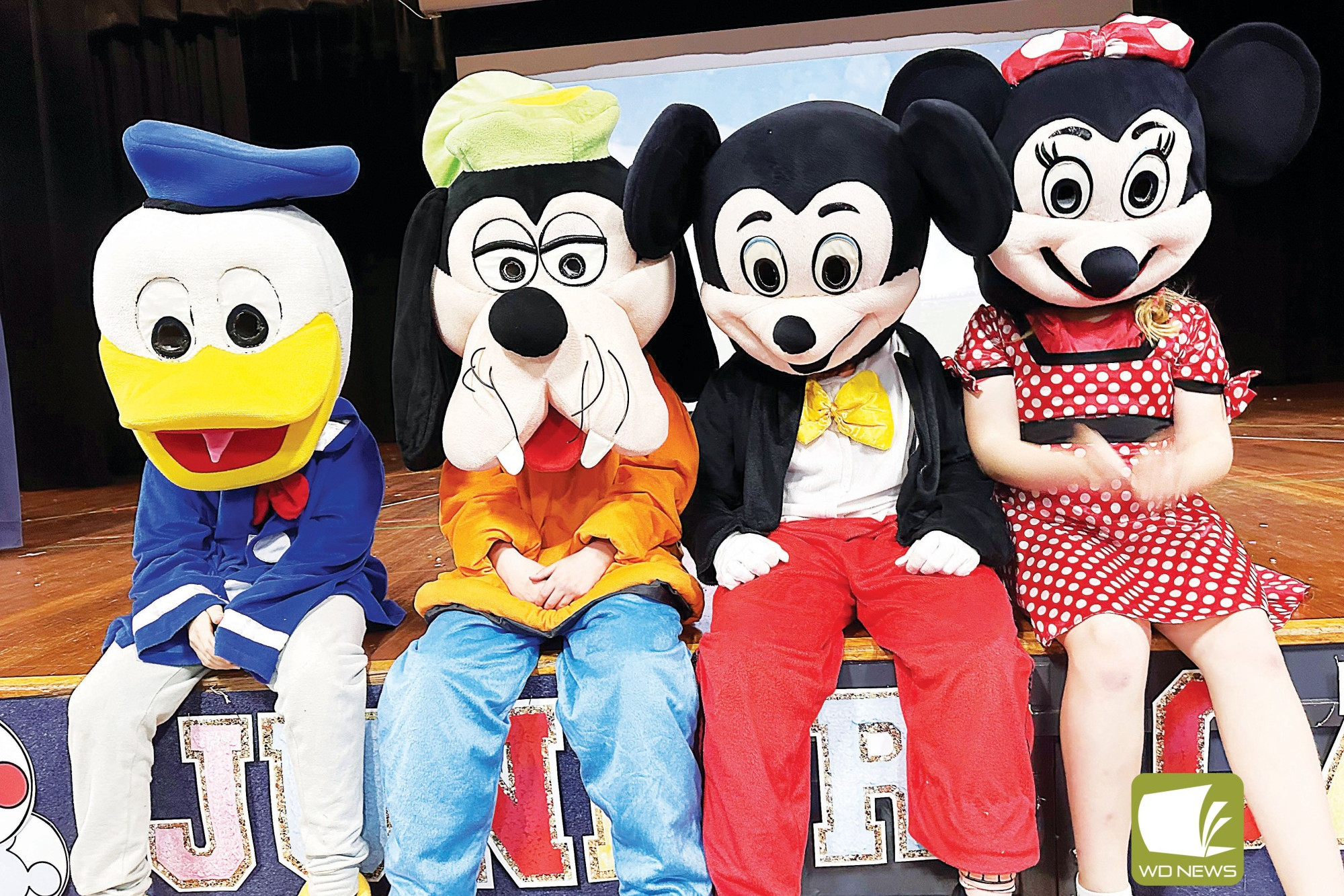 Marking 100 years of Disney: Students of Camperdown College’s junior campus joined Donald Duck, Goofy, Mickey Mouse and Minnie Mouse in marking a special milestone.