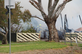 Powerless: CFA volunteers did their best to extinguish the fire but could not stop it from destroying the house. 