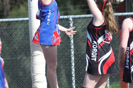 Anna Dickson leaps to get hands over the shot of Koroit’s Layla Thom.
