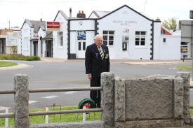 Lest We Forget: Mortlake Returned Services League president Merv Hampson pays his respects at the town’s monument on Anzac Day. 